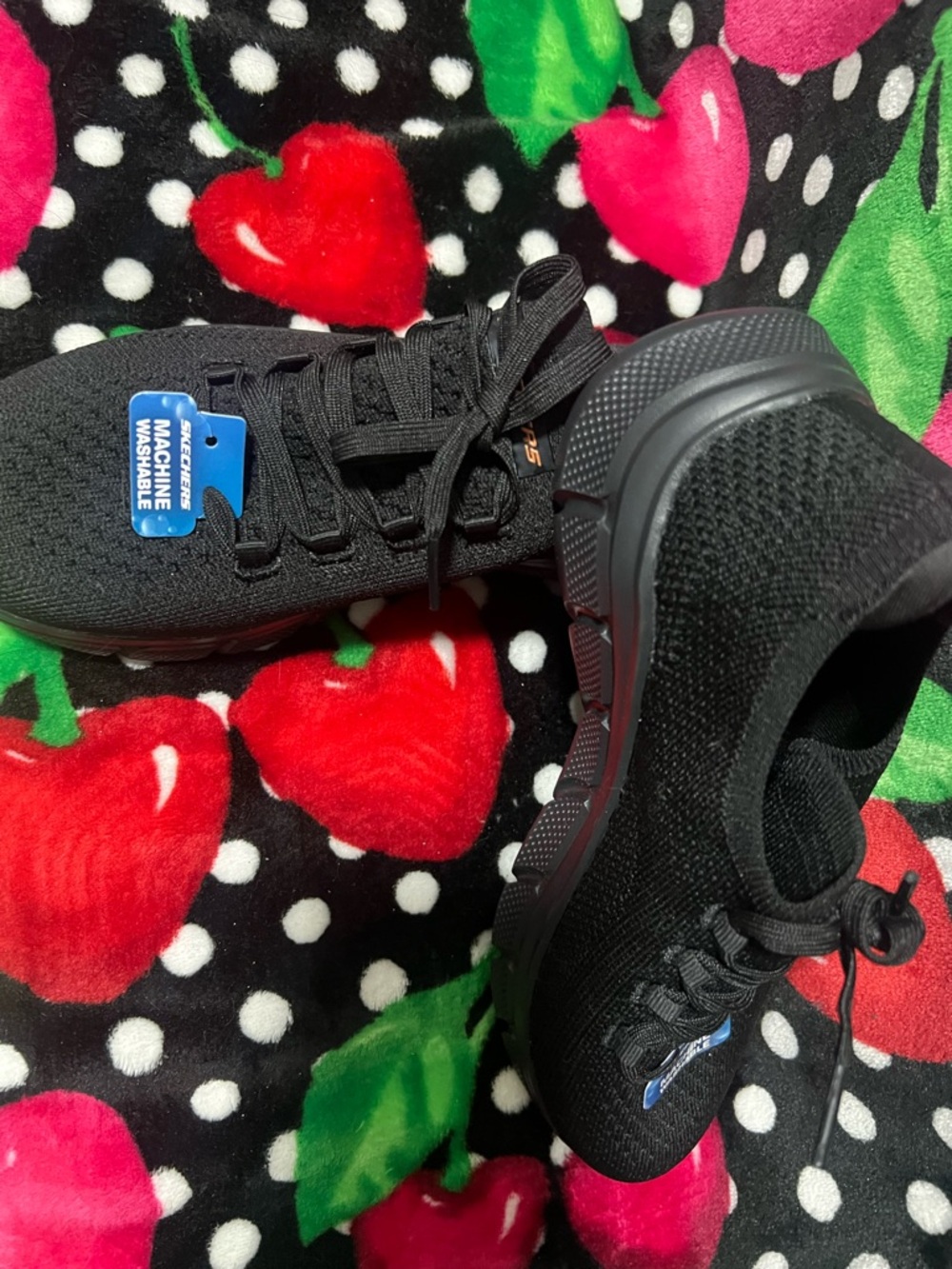 Skechers Women's Black Knit Slip-On Sneakers